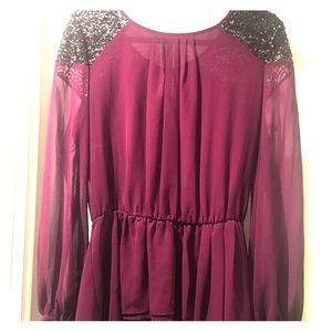Plum blouse w/sequin shoulders. Size L. NWT